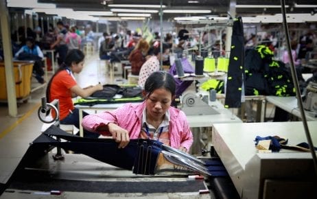 Garment workers in a factory in Cambodia on December 9, 2014 (ILO)