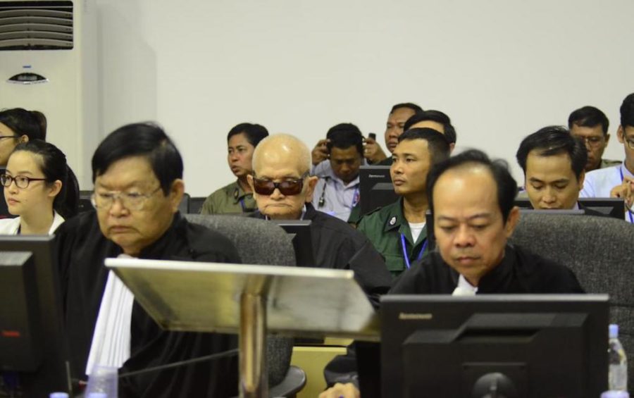 Noun Chea (with sunglasses) and members of his defense team, including Doreen Chen (far left), Son Arun (front left) and Suon Visal (front right) in the courtroom for a trial hearing on January 8, 2015. (ECCC)