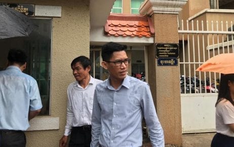 Former Radio Free Asia journalists Uon Chhin (left) and Yeang Sothearin (right) exit the Phnom Penh Municipal Court after their verdict announcement was delayed on August 30, 2019. (Ouch Sony/VOD)