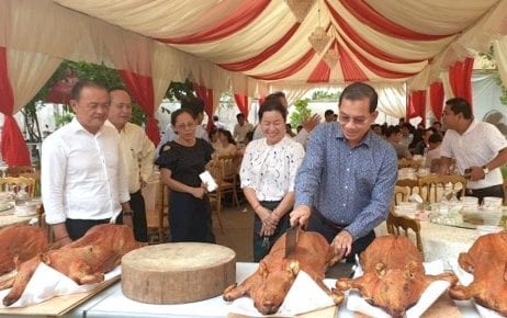 Tan Phannara, director of the Agriculture Ministry’s animal health department, presides over a ‘Safe Pork-Eating’ event on August 7, 2019.