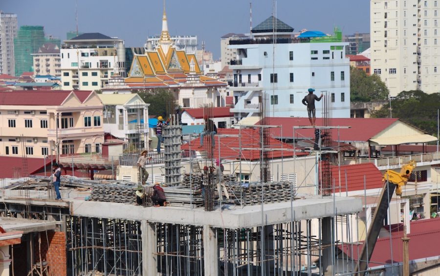 Construction workers at a building site in Phnom Penh in January 2015 (Philip Brookes/Flickr)