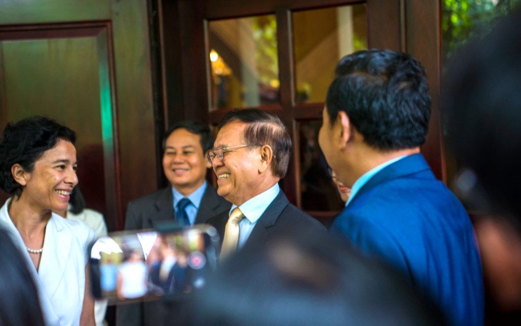 French Ambassador Eva Nguyen Binh and CNRP president Kem Sokha at the front door of his house on November 11, 2019. (Sanh Bun Hoeun/VOD)