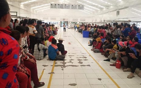 Factory workers gather for a strike at the Dignity Knitter factory in Kandal province on January 17, 2020. (Sok Sreysros/Supplied)