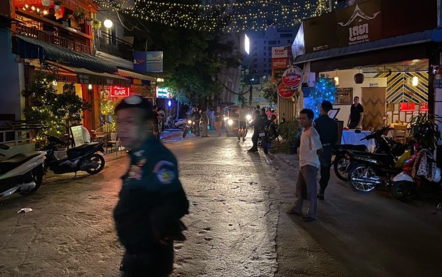 Authorities close down bars on Street 308 in Phnom Penh's Tonle Bassac district on March 17, 2020, following government orders to shut a number of venues in an effort to limit the spread of the Covid-19 respiratory disease (Christopher Rompre)
