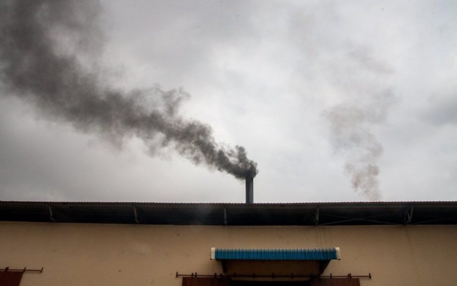 Smoke belches from an incinerator at the Medical Waste Management Unit's Dangkor landfill in Phnom Penh on April 9, 2020. (Gerald Flynn)