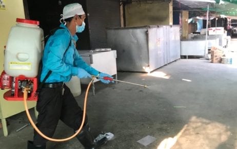 An official sprays disinfectant in the Takeo market in Daun Keo City in Takeo province in late March 2020 (Ouch Sony/VOD)