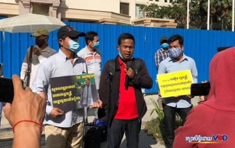 Former employees of The Great Duke Hotel protest in front of the shuttered hotel building in Phnom Penh to demand awarded compensation on May 21, 2020. (Nat Sopheap/VOD)