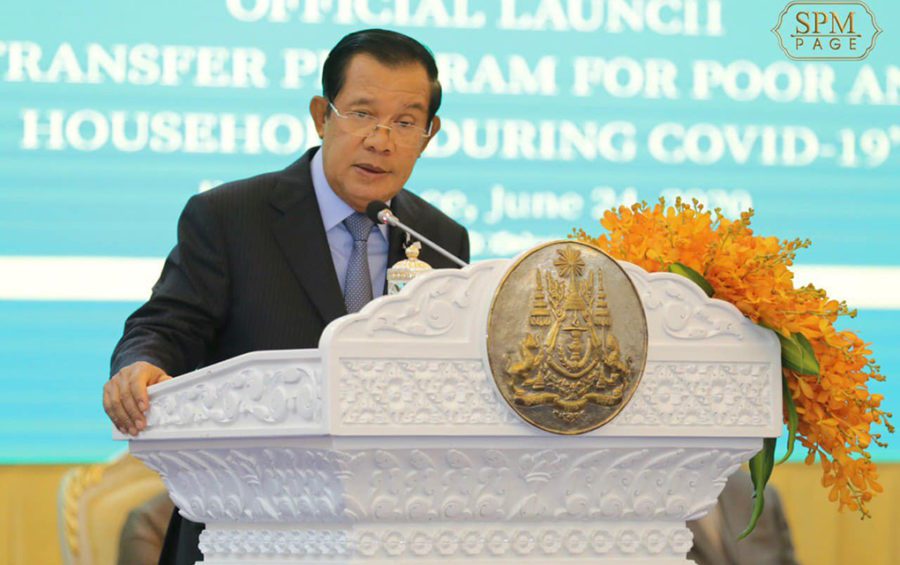 Prime Minister Hun Sen speaks at the launch of a fund to assist low-income citizens at the Peace Palace in Phnom Penh, in this photograph posted to his Facebook page on June 24, 2020.
