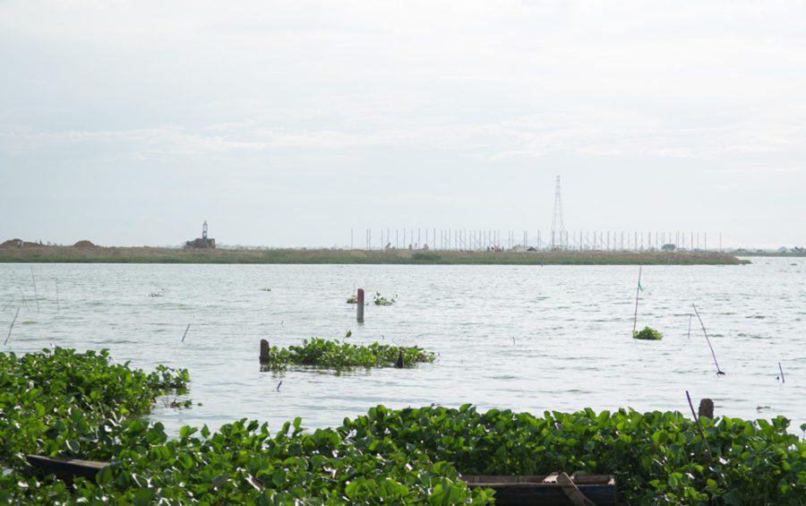 Lake-filling activity seen across the water at Tamok Lake on June 26, 2020. (Seav Meng/VOD)