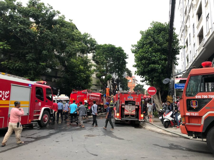 Fire trucks arrive following an explosion in Phnom Penh’s Daun Penh district on July 18. (Matt Surrusco)