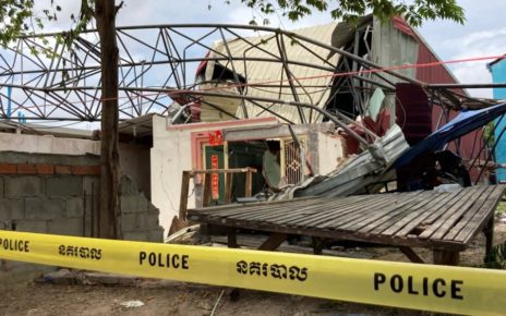 Police tape prevents villagers from entering the front yard of this house in Poipet where five women were killed on August 12, 2020 by a collapsed crane while playing cards. (Ananth Baliga/VOD)