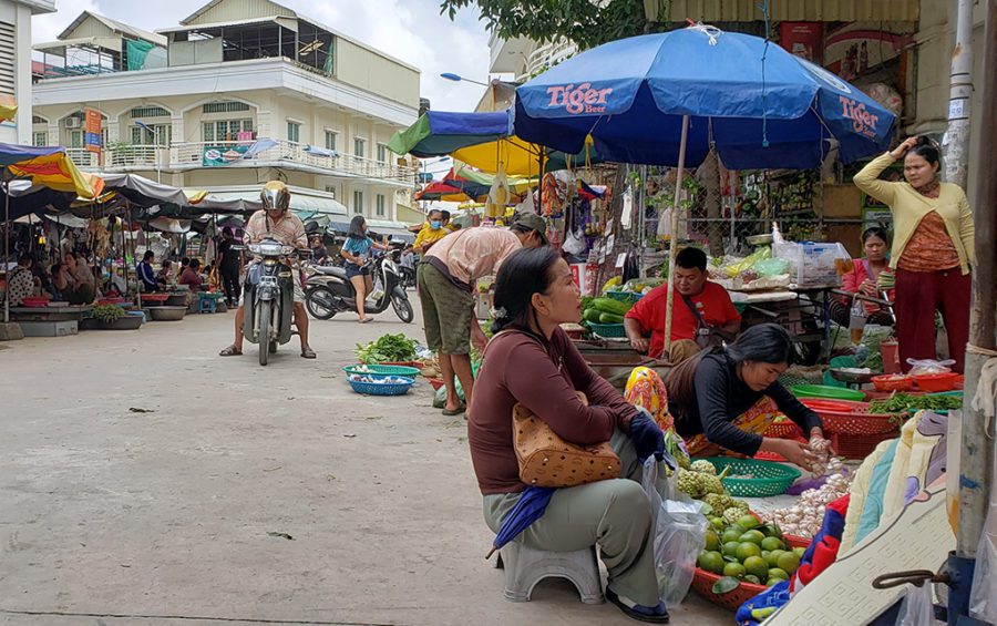 Street vendors sell produce and meat outside Phnom Penh's Chak Angre market on October 20, 2020. (Danielle Keeton-Olsen/VOD)
