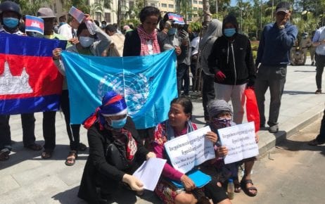 Demonstrators, including activist Sath Pha (front center), rally outside the U.S. Embassy in Phnom Penh on October 23, 2020 (Mech Dara/VOD)