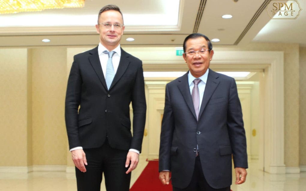 Hungarian Foreign Minister Peter Szijjarto and Prime Minister Hun Sen pose for a photo during Szijjarto’s official visit to Phnom Penh on November 3, 2020, in a photo posted to Hun Sen’s Facebook page.