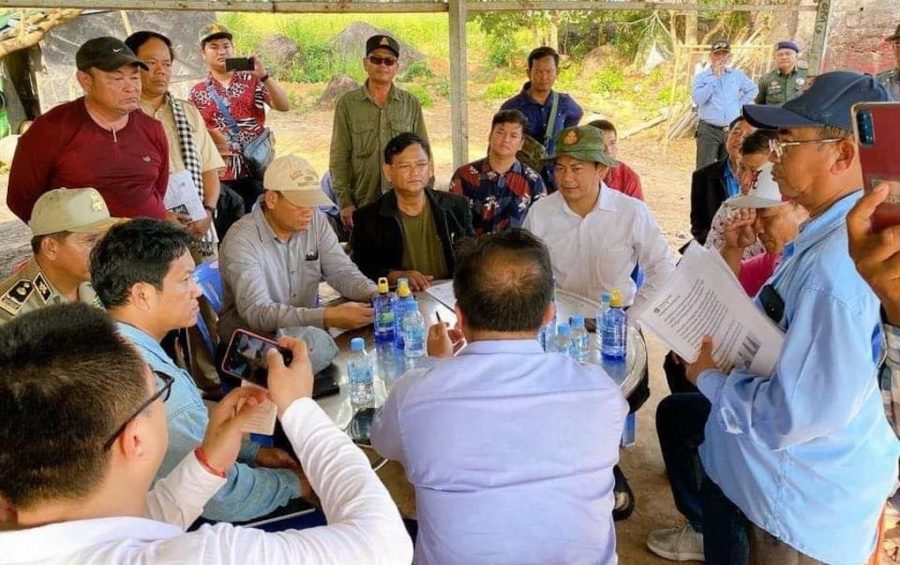 Doung Dara, an assistant to Prime Minister Hun Sen, (seated, in white shirt) meets with people in Kampot province on November 6, 2020, in this photograph posted to his Facebook page.