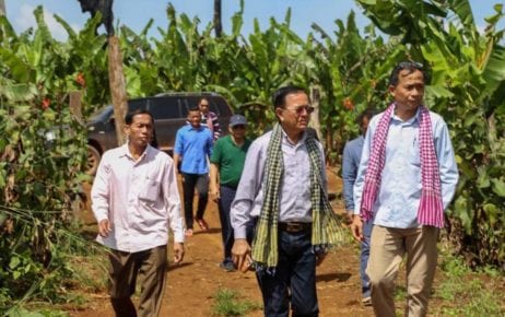 CNRP co-founder Kem Sokha, center, and GDP co-founder Yang Saing Koma, right, during a visit to a farm in Pursat province in November 2020, in this photograph posted to Saing Koma's Twitter page.