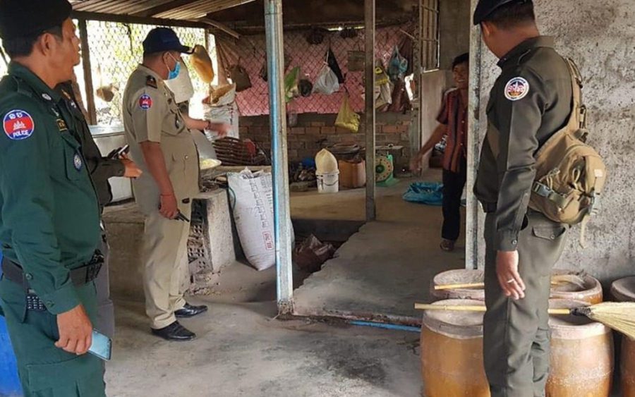 Authorities inspect a rice wine workshop in Kampong Chhnang province on November 29, 2020. (Kampong Chhnang provincial police)