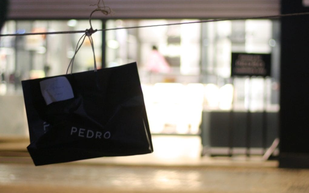 Fashion store Pedro, in Phnom Penh’s Boeng Keng Kang I, was roped off as possible Covid-19 contacts awaited testing on the evening of December 4, 2020. (Michael Dickison/VOD)