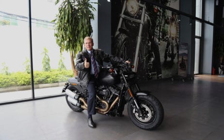 U.S. Ambassador Patrick Murphy poses on a Harley Davidson motorcycle at the Phnom Penh store, in a photo posted to the U.S. Embassy Facebook page on September 30, 2020.
