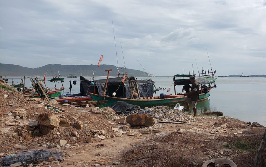 Fishermen dock their boats just north of a coastal reclamation project at Ream Bay in Preah Sihanouk province's Ream commune on December 1, 2020. (Danielle Keeton-Olsen/VOD)