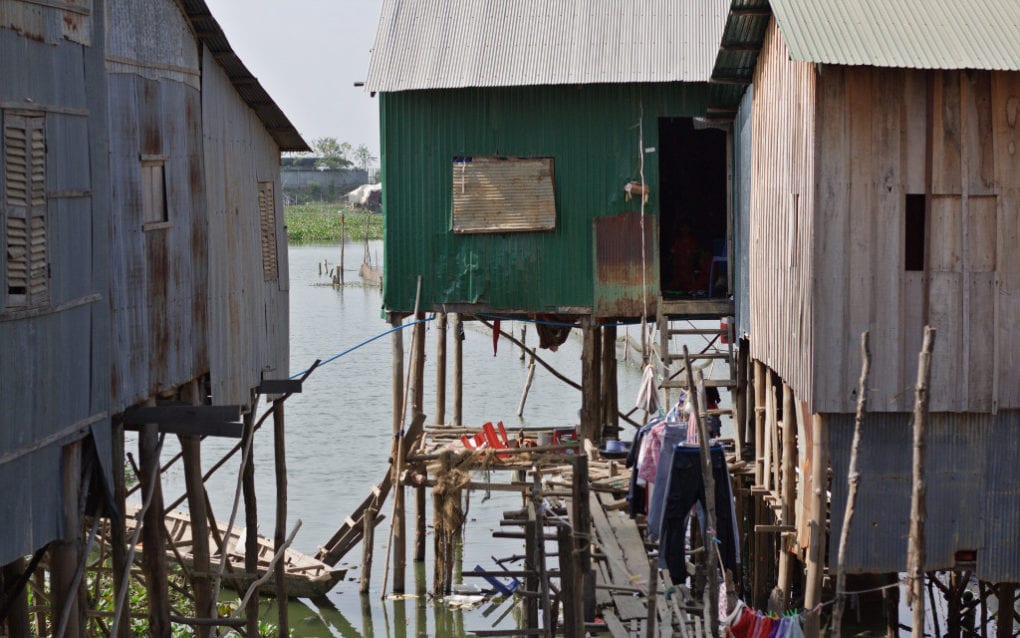 A house, in green, on Phnom Penh’s Boeng Tamok lake where residents said 18 people live in a space about 4 meters by 4 meters, on January 24, 2021. (Michael Dickison/VOD)