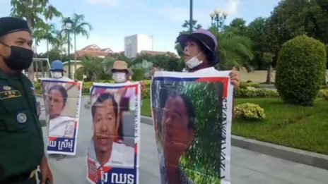 Protesters outside the US Embassy on May 28, 2021 call for the release of political prisoners amid a Covid-19 outbreak in the country’s prisons, in a screenshot from a video supplied by protesters’ families.