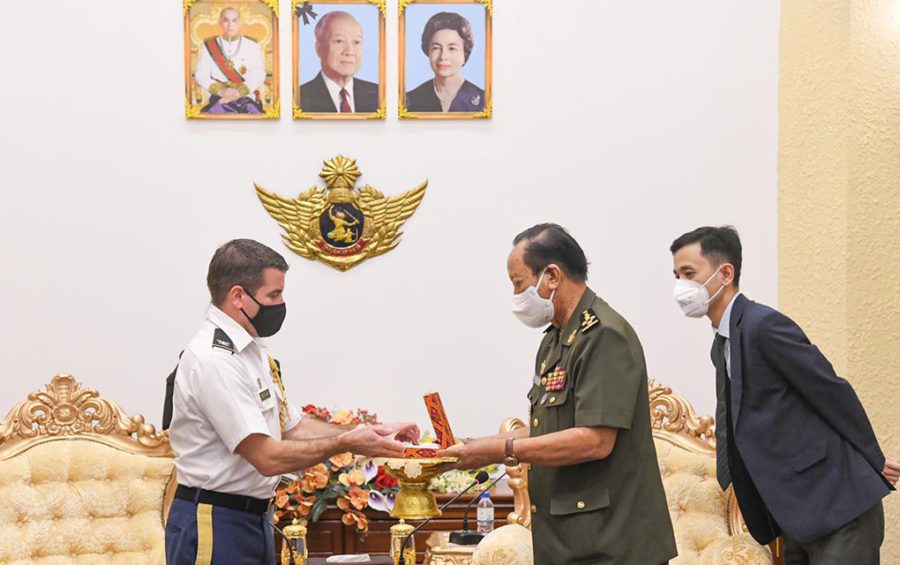 Defense Minister Tea Banh presents a gift to U.S. defense attache Marcus Ferrara during his visit in a photo posted to Banh's Facebook page on June 8, 2021.