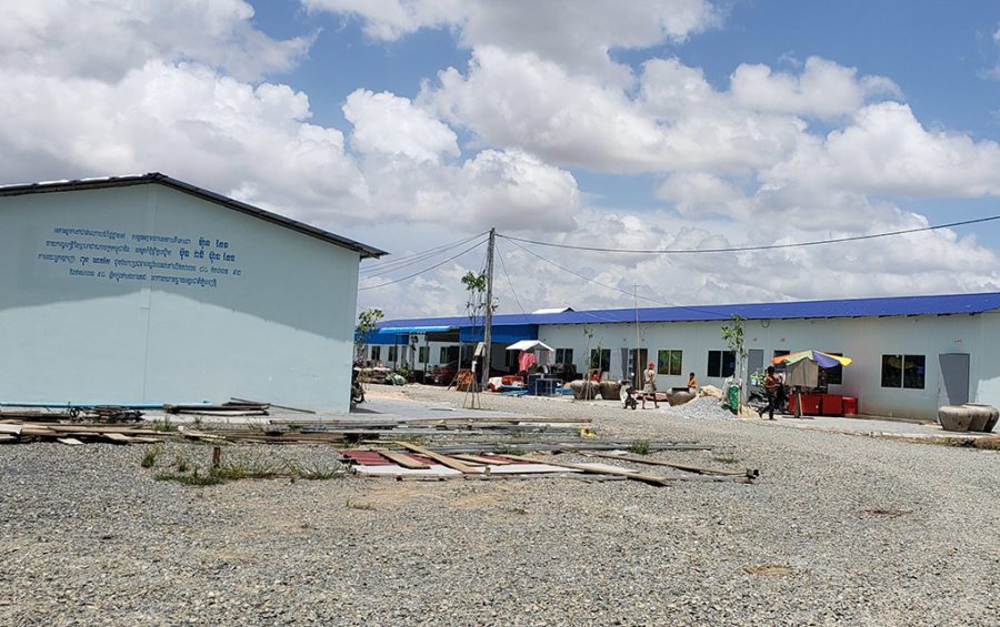 Newly constructed housing offered to families who lived and fished along streams within the grounds of the new Phnom Penh airport development, which say they were gifted by Prime Minister Hun Sen on the side, in Takeo province on June 22, 2021. (Danielle Keeton-Olsen/VOD)