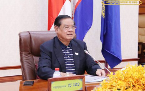 Deputy Prime Minister Sar Kheng at a podium during a meeting, in a photo posted to his Facebook page on August 9, 2021.