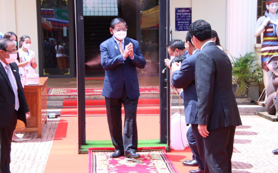Interior Minister Sar Kheng is greeted in Ratanakiri province, in a photo posted to his Facebook page on October 12.