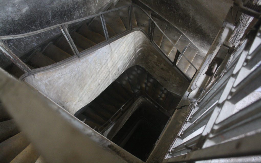 A stairwell at an abandoned school building on Phnom Penh’s Street 144, on October 15, 2021. (Michael Dickison/VOD)