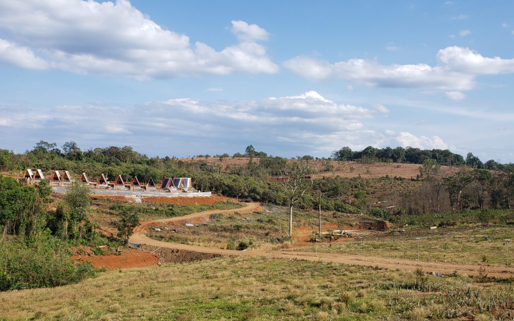 A colorful tented resort along a newly-plowed road seen from the edge of Mondulkiri's Keo Seima Wildlife Sanctuary on February 11, 2021. (Danielle Keeton-Olsen/VOD)