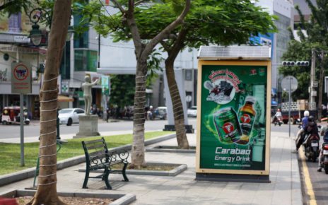 Energy-drink advertising promoting prizes, in Phnom Penh on November 4, 2021. (Michael Dickison/VOD)