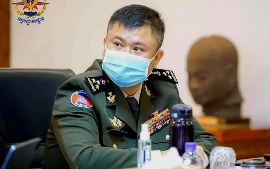 Hun Manith, the premier's second son and leader of RCAF's intelligence unit, wearing a uniform and mask in a photo posted May 21, 2021. (Facebook)