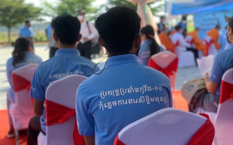 A participant at a human rights day event on December 10 in Phnom Penh's Russei Keo district watches the proceedings. (Kuoy Langdy/VOD)