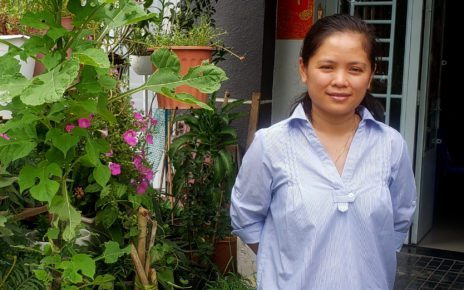 LRSU president Chhim Sithar stands in front of a garden she planted outside her home in Phnom Penh on May 26, 2021. (Danielle Keeton-Olsen/VOD)
