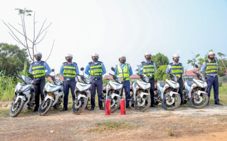 Siem Reap police officers pose with motorbikes after a training on fire hydrants in a photo posted March 15, 2022. (Siem Reap Province Information Department Facebook page)