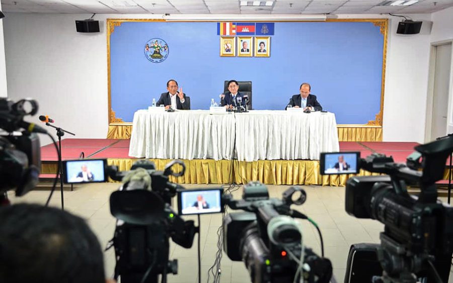 National Election Committee officials speak during a press conference on March 25, 2022. (NEC Facebook page)