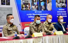 Thai assistant commissioner-general Surachate Hakparn, center, addresses the press conference on March 18, 2022.