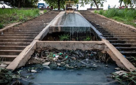 Sewage flows into the river from a drain in Phnom Penh's Daun Penh district on May 16, 2022.