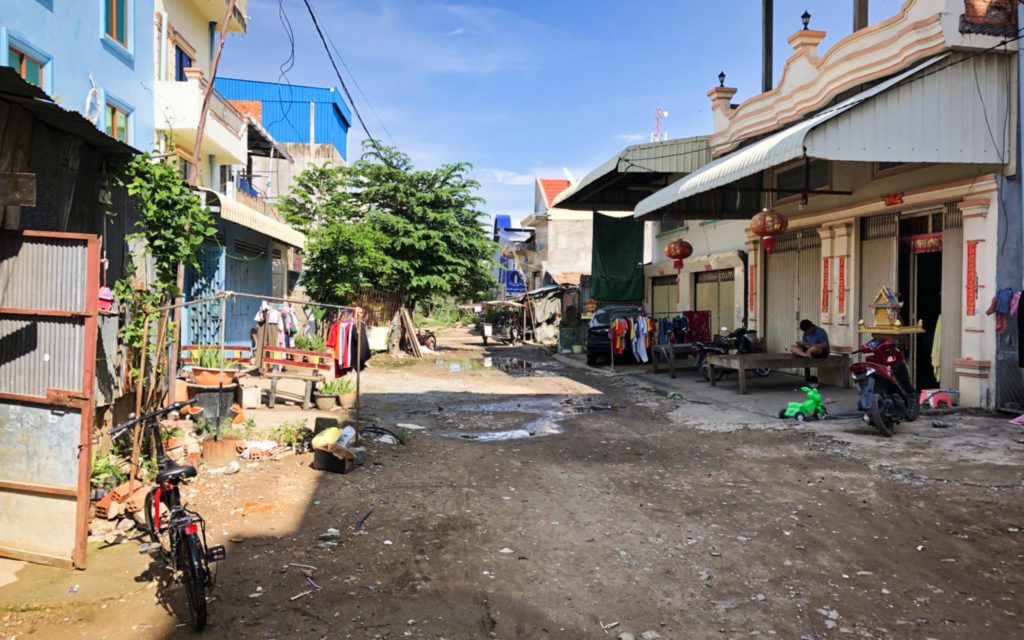 The street where Chao Ratanak and her family live in Poipet commune. Her father, Chao Veasna, says he’s asked the commune to pave their road but officials have cited budget constraints. (Matt Surrusco/VOD)