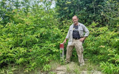 Wildlife Alliance's Nick Marx stands at one of the border posts erected at Phnom Tamao in recent months.