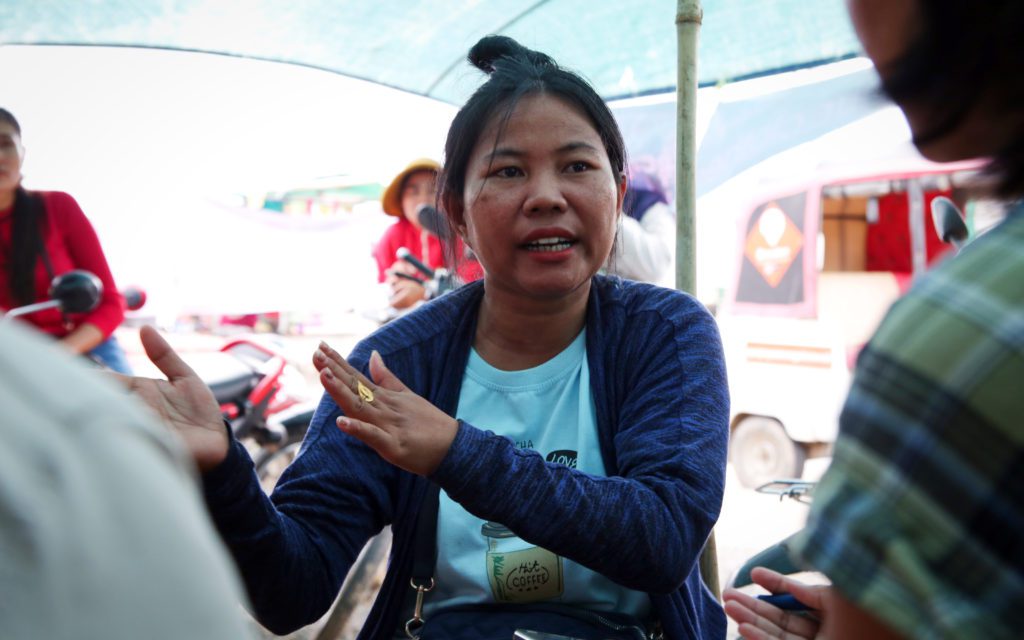 A worker speaks to reporters outside Phnom Penh’s Canteran Apparel factory on Veng Sreng Blvd on July 21, 2022. (Hean Rangsey/VOD)