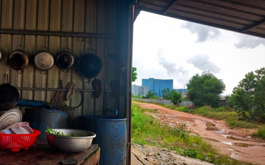 The kitchen inside Im Sary's restaurant, where Chinatown is visible in the background, in Preah Sihanouk province's Bit Traing commune on May 29, 2022. (Danielle Keeton-Olsen/VOD)