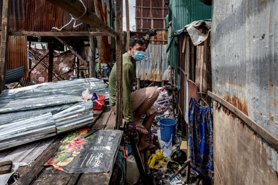 Nov Nim sits where his house was dismantled by authorities, in Phnom Penh’s Russei Keo district on July 20, 2022. (Roun Ry/VOD)