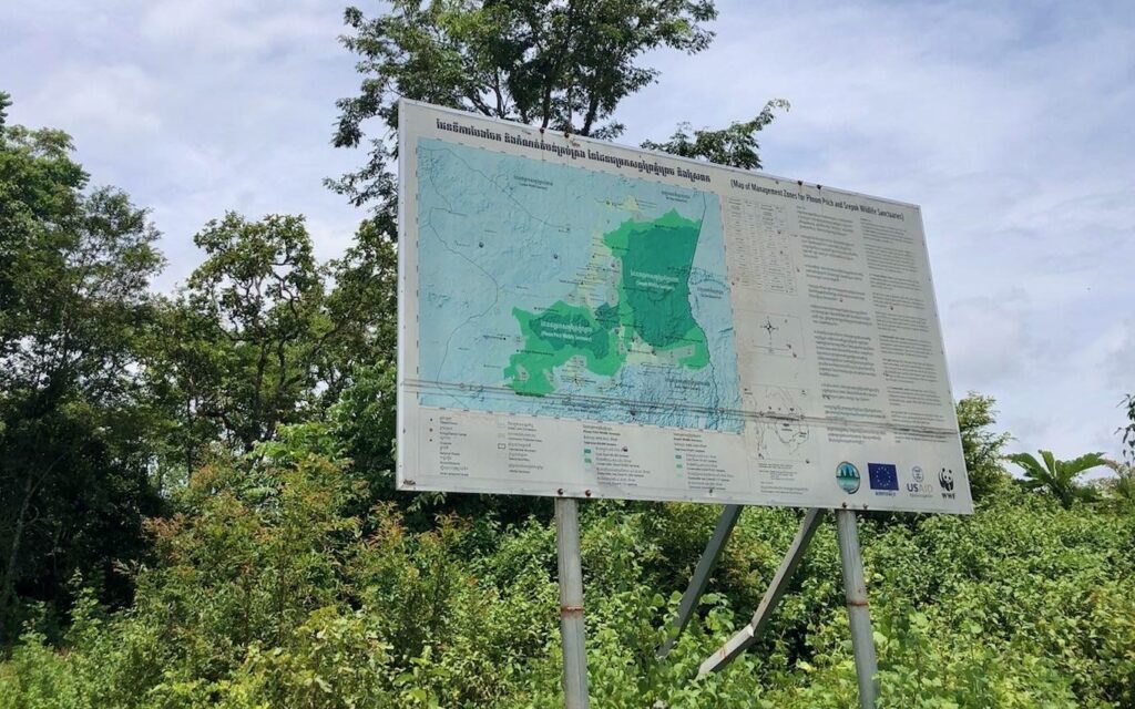 A billboard showing a map of zones in Phnom Prich and Sreypok protected areas. (Fiona Kelliher/VOD)