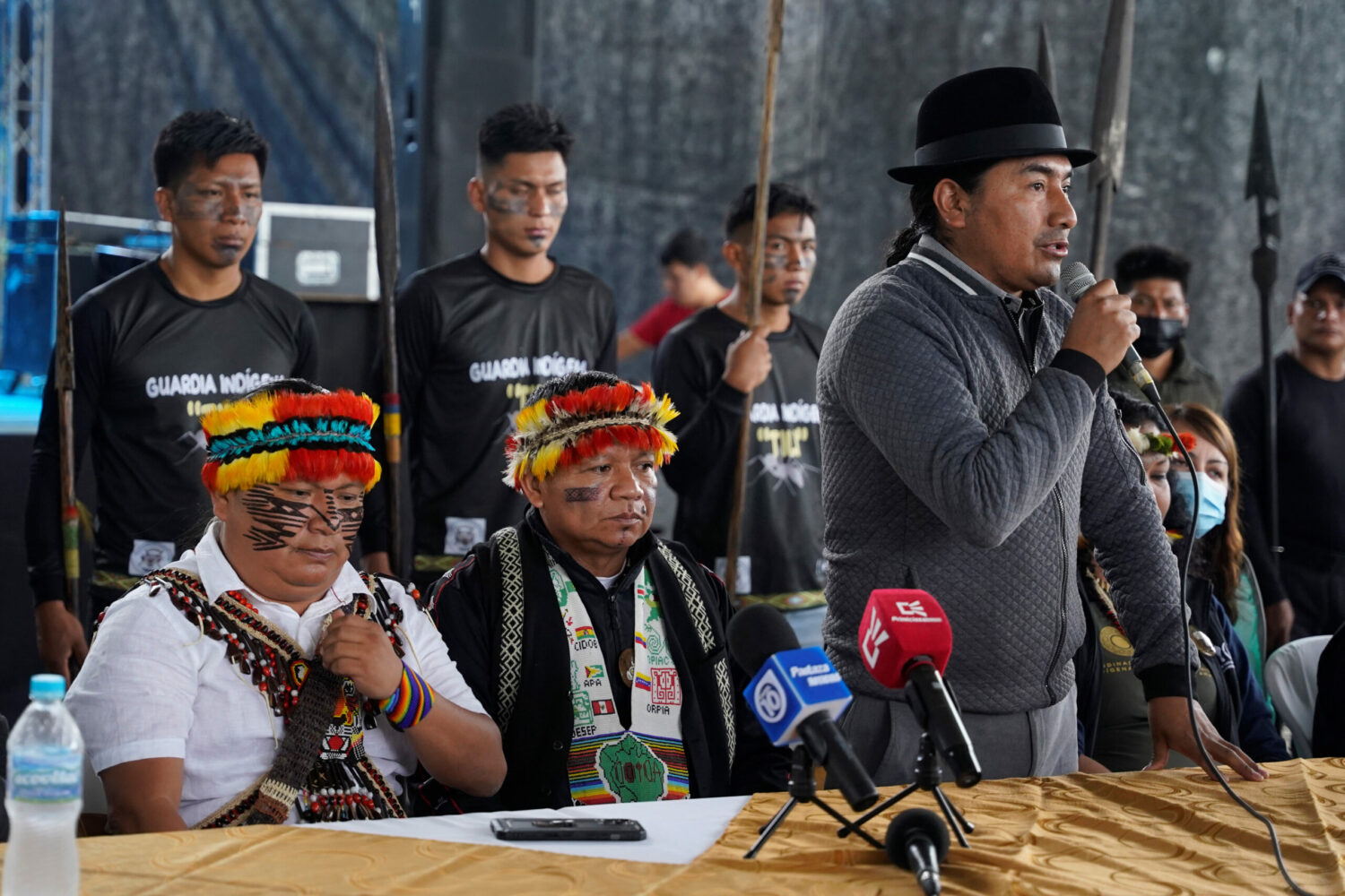 Leaders from indigenous communities in the Amazon basin hold a news conference during a meeting where they demanded South American governments halt extractive industries that damage the rainforest, in Union Base, Ecuador March 15, 2022. (REUTERS/Johanna Alarcon)