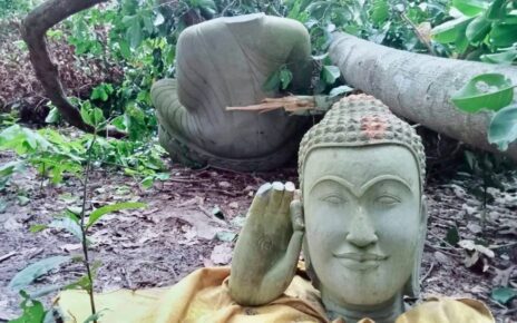 The broken Buddha statue in the Metta forest, in a supplied photo taken on September 23, 2022.