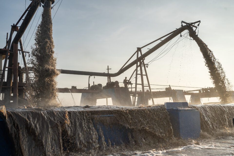 Sand mining barges extract sand from the Mekong, a river that supports the livelihoods of an estimated 60 million people in the region. (Andy Ball/University of Southampton)