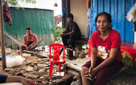 Prek Sopheap, 55, with neighbors from the Prek Tnaut river in Phnom Penh's Dangkao district on November 25, 2022. (Fiona Kelliher/VOD)